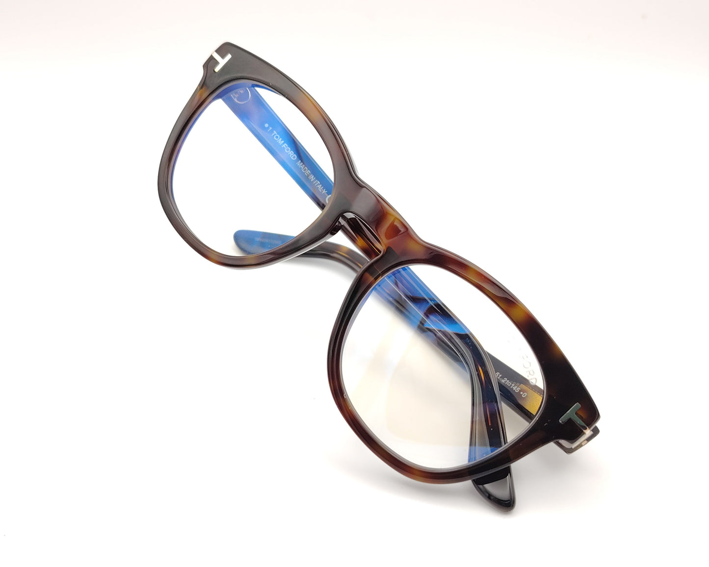 gafas redondas color carey con montura de pasta y detalle metálico lateral