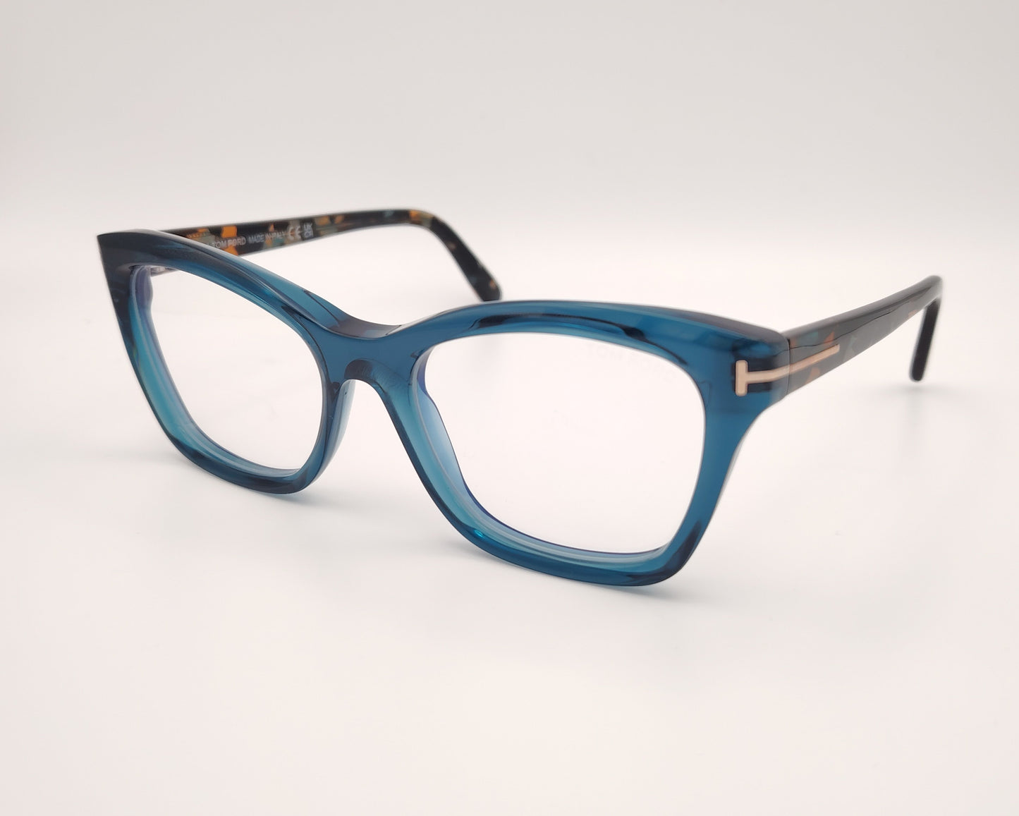 gafas tom ford tf5909b 092 con montura de acetato azul translúcida y varillas jaspeadas habana y detalles metálicos