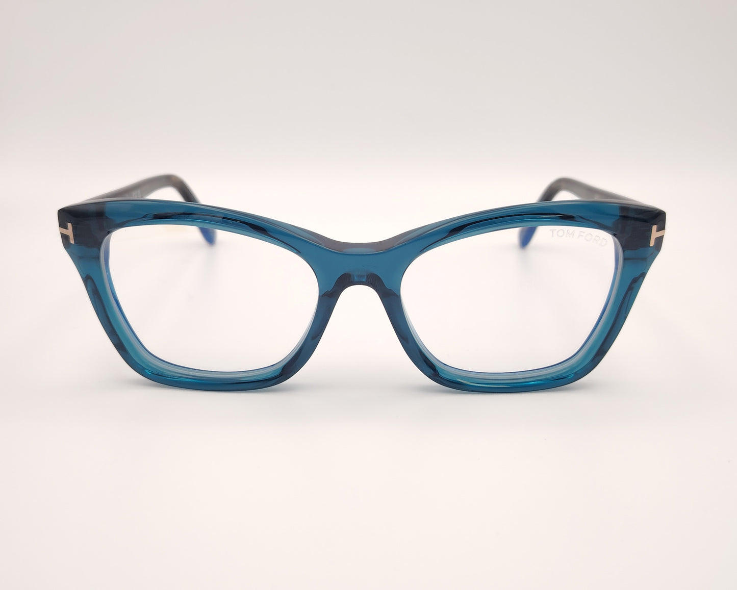 gafas tom ford tf5909b 092 con montura de acetato azul translúcida y varillas jaspeadas habana y detalles metálicos