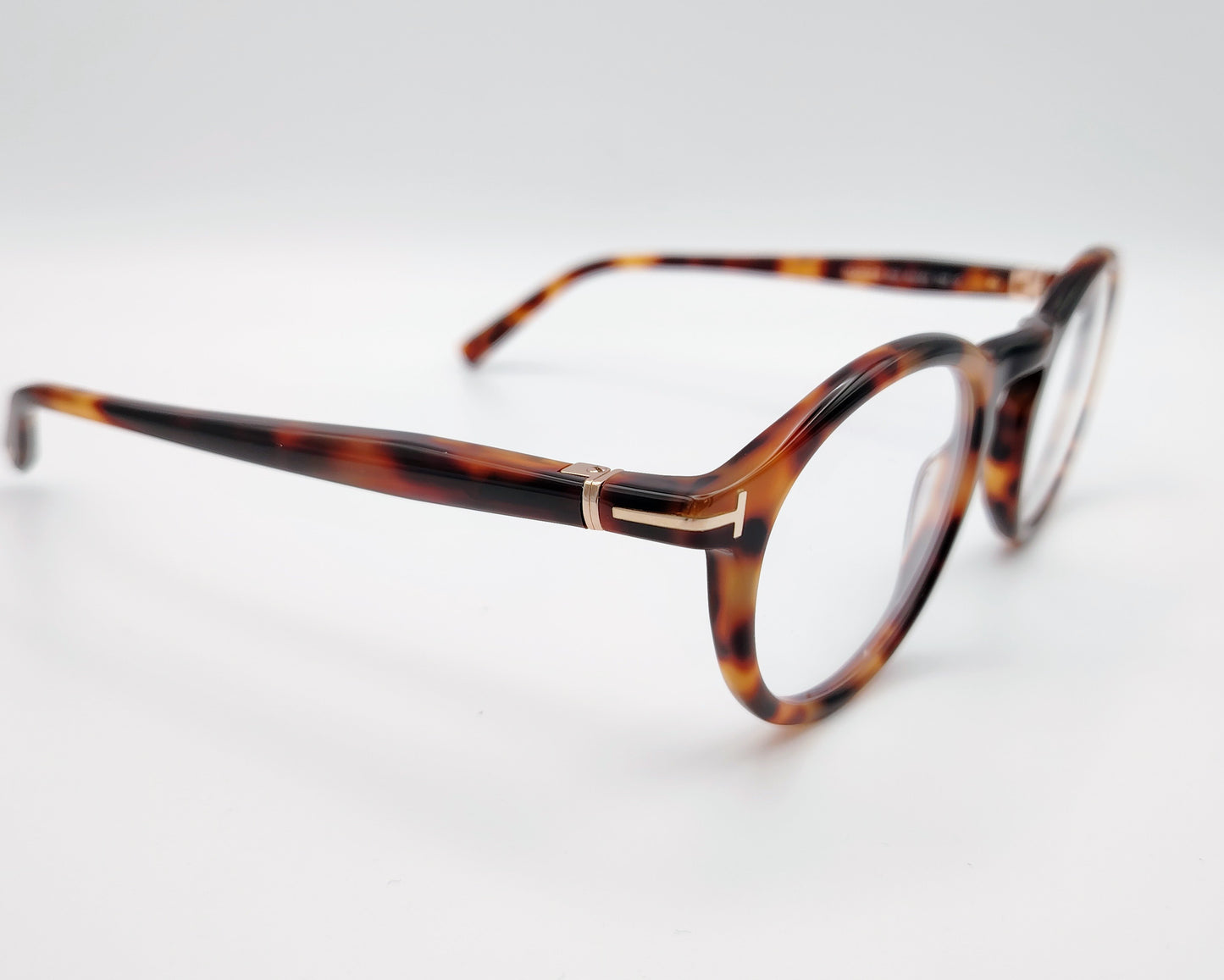 tom ford tf5979b 053 gafas de vista en acetato habana con forma redonda y detalle metálico en varillas