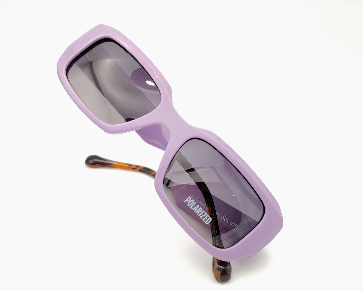 visionario bianca 04 gafas de sol formato rectangular de acetato en color lila con las lentes polarizadas degradadas