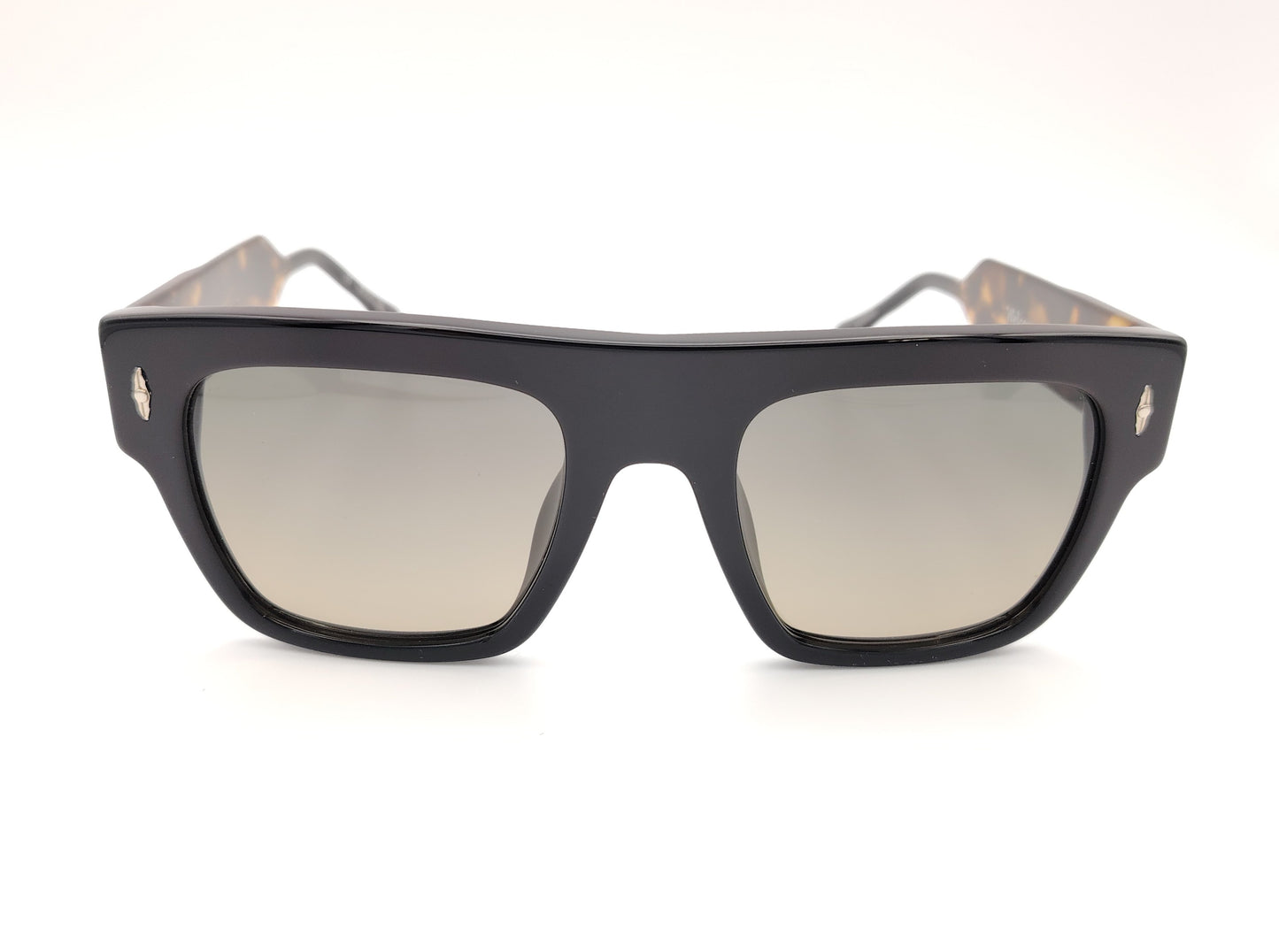 gafas de sol visionario howard 03 con montura rectangular en color negro, patillas con estampado carey y detalles dorados, lentes polarizadas en tono marrón degradado