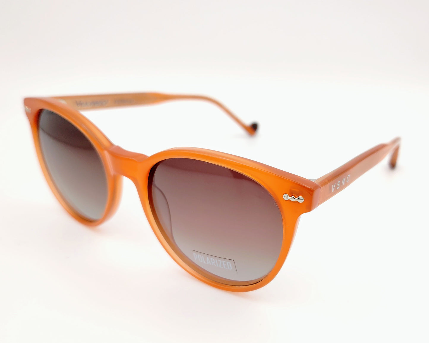 visionario petra 04 gafas de sol de acetato estilo redondo en color naranja suave con lentes polarizadas degradadas marrones