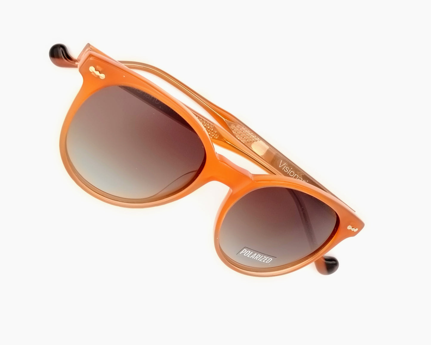 visionario petra 04 gafas de sol de acetato estilo redondo en color naranja suave con lentes polarizadas degradadas marrones
