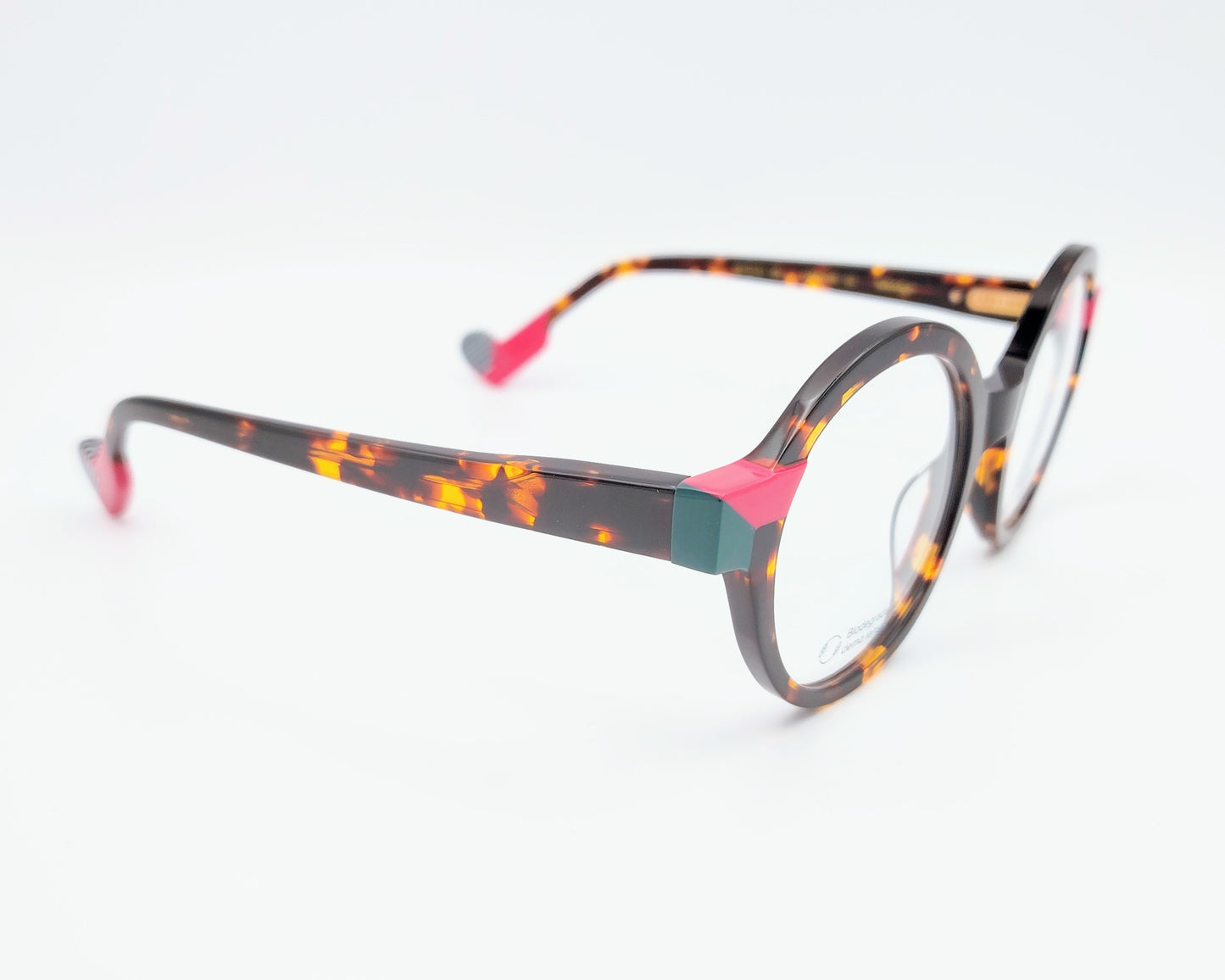gafas graduadas woodys absinthe 02 redondas carey con detalles en rosa fucsia y verde