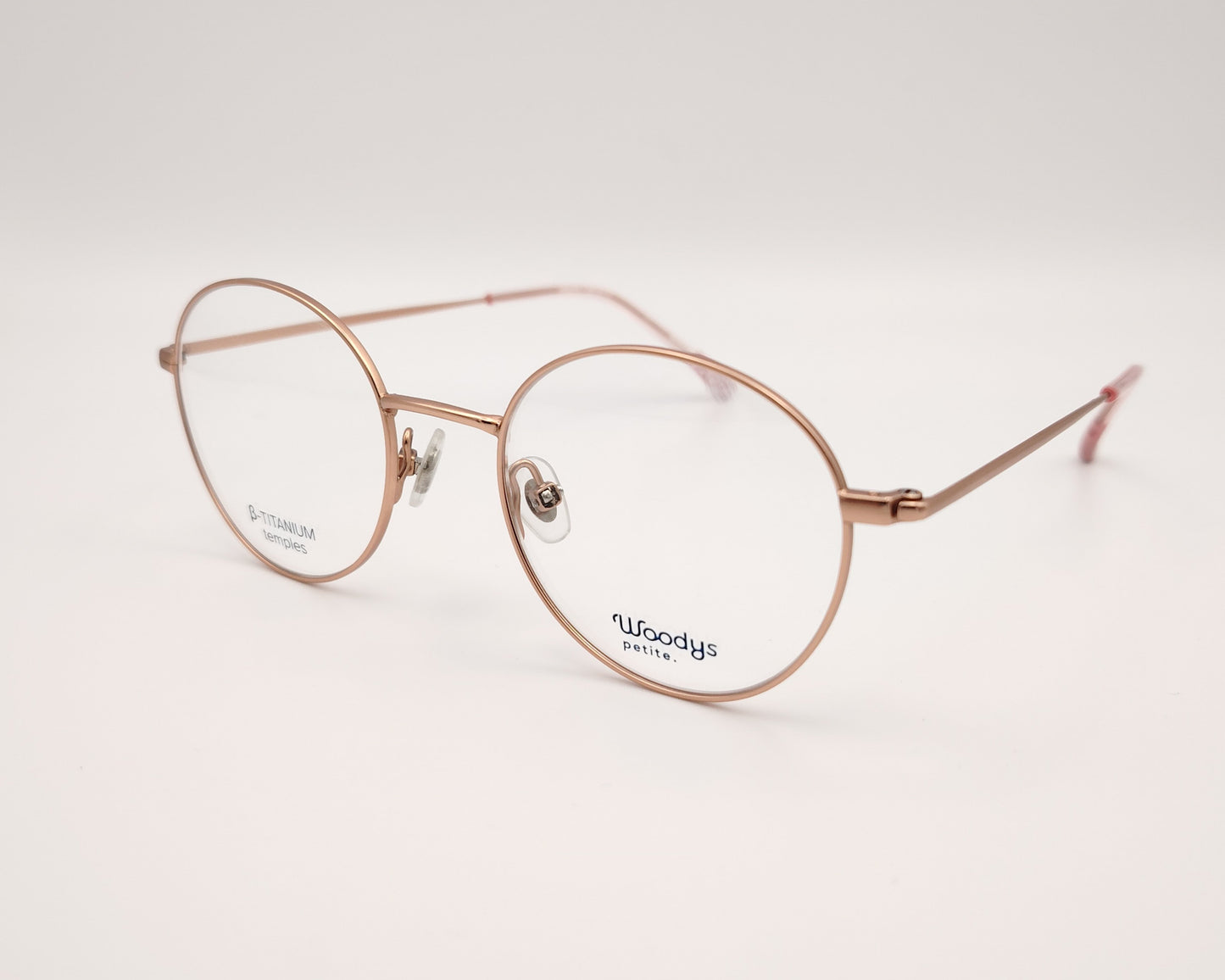 gafas woodys alix 03 de titanio dorado y forma redonda