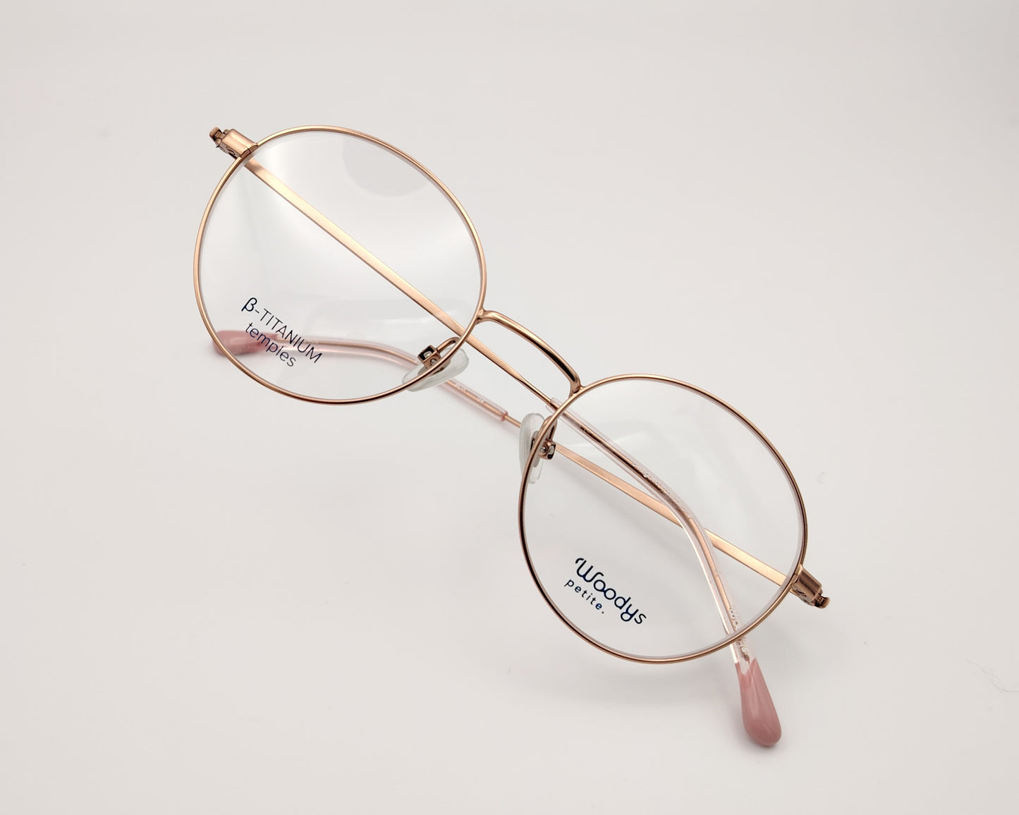 gafas woodys alix 03 de titanio dorado y forma redonda