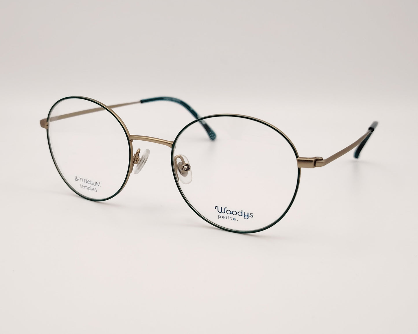 gafas woodys alix 03 de titanio dorado con lacado verde y forma redonda