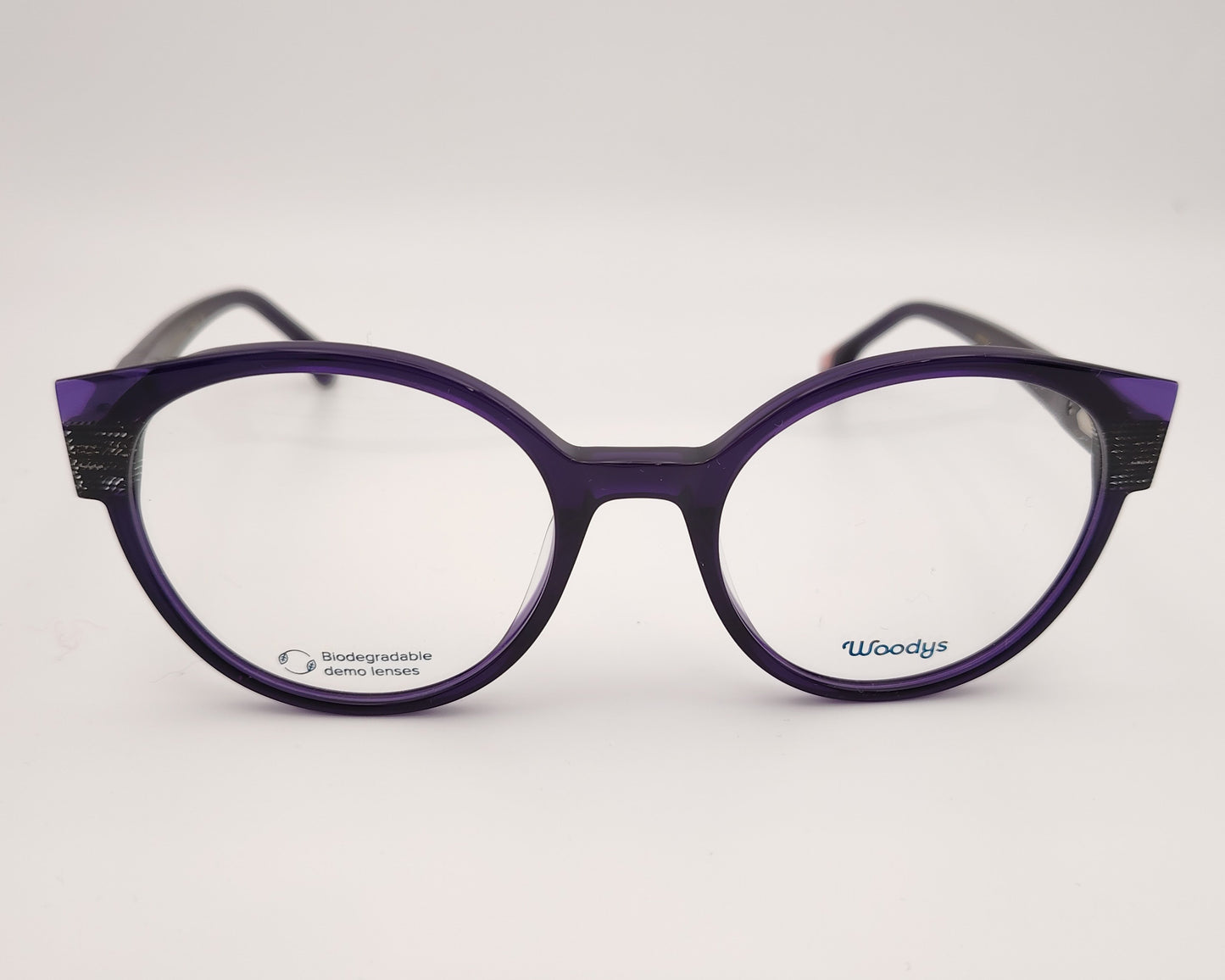 woodys daisy 01 gafas de acetato en formato redondo en color violeta con detalles en patrón negro y transparente en talones y varillas