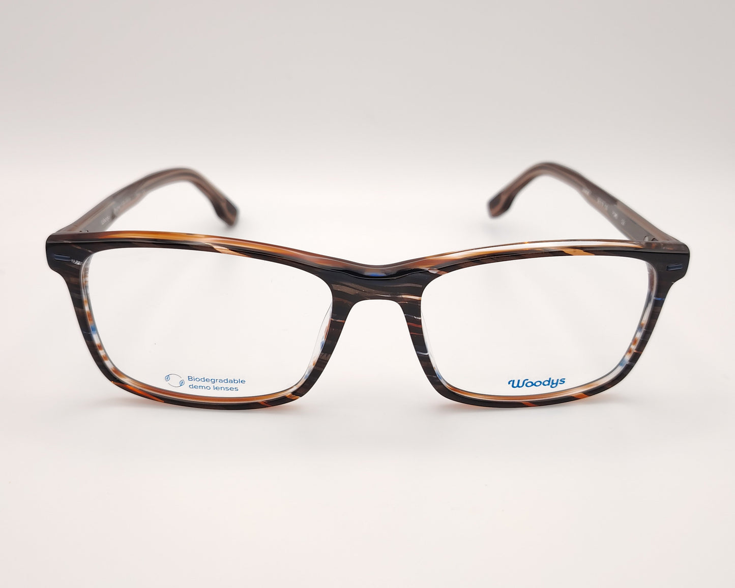 gafas graduadas woodys ford 02 con montura rectangular de acetato en tonalidades carey con detalles en azul y blanco siguiendo un patrón rayado diseño ligero