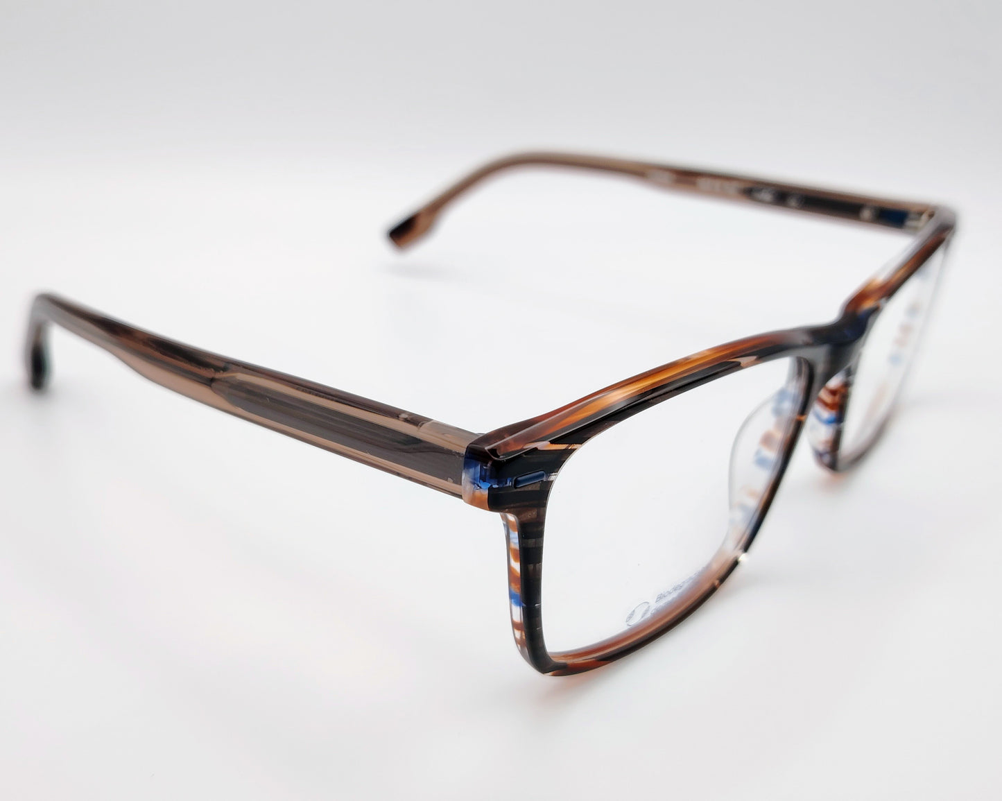 gafas graduadas woodys ford 02 con montura rectangular de acetato en tonalidades carey con detalles en azul y blanco siguiendo un patrón rayado diseño ligero