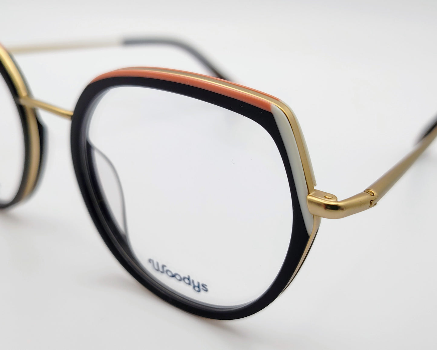 woodys ionna 01 gafas de metal con aro de acetato de color negro rosa y blanco en forma redondeada y ligeramente cat eyes