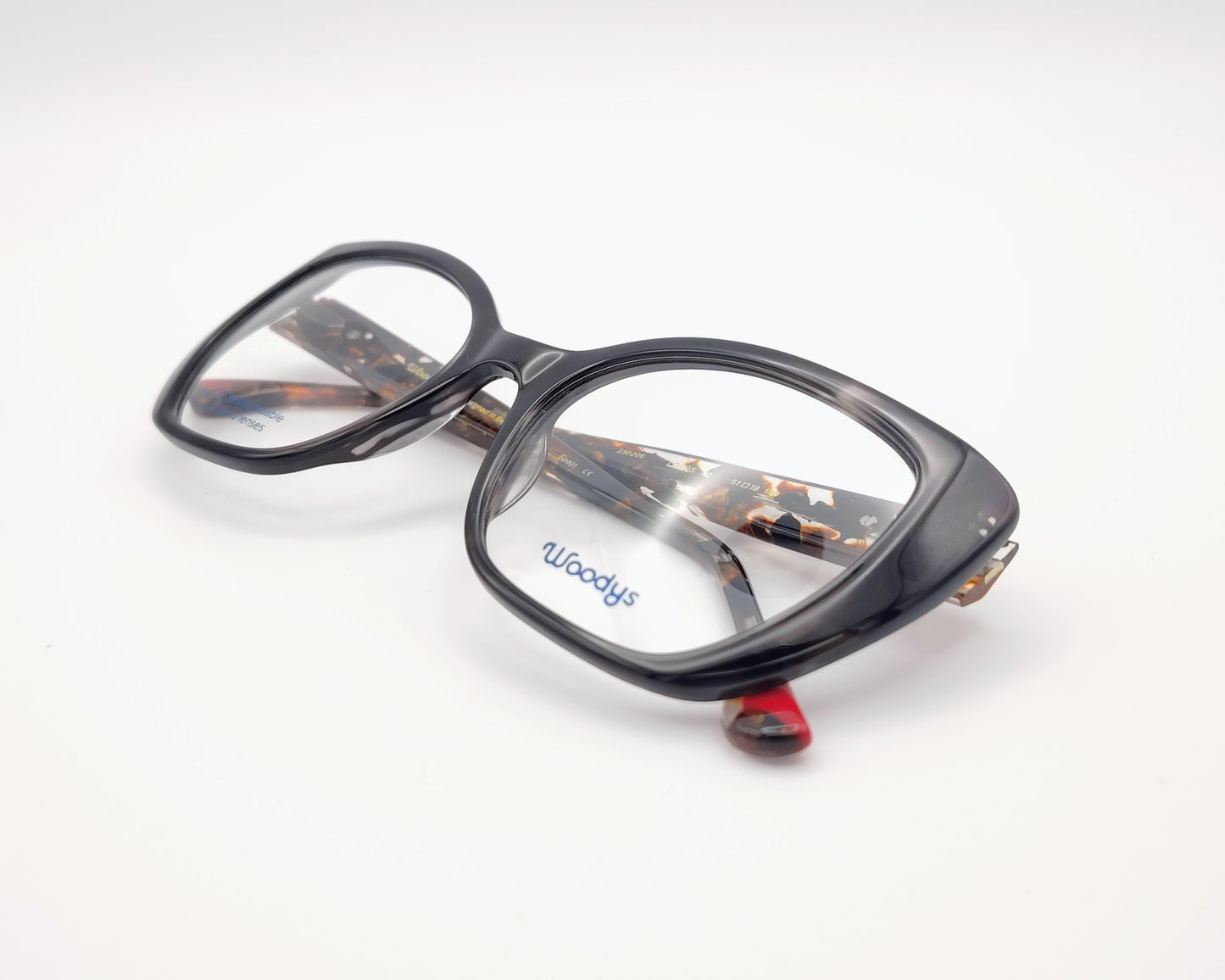 woodys loyds 01 gafas graduadas montura de acetato de estilo cat eyes color negro con detalles en carey varillas con estampado moteado diseño moderno y llamativo