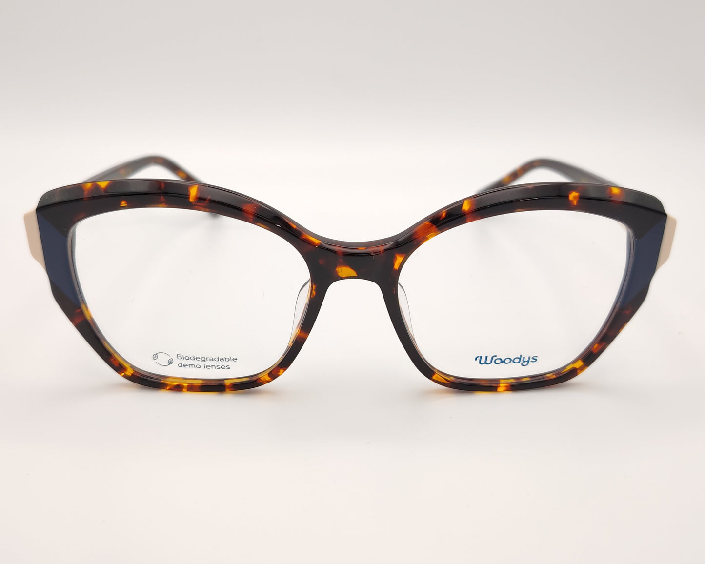 gafas graduadas woodys midway 02 con montura de acetato en estampado habana y detalle en azul en la parte exterior de diseño geométrico elegante con detalles en tono marfil en las varillas