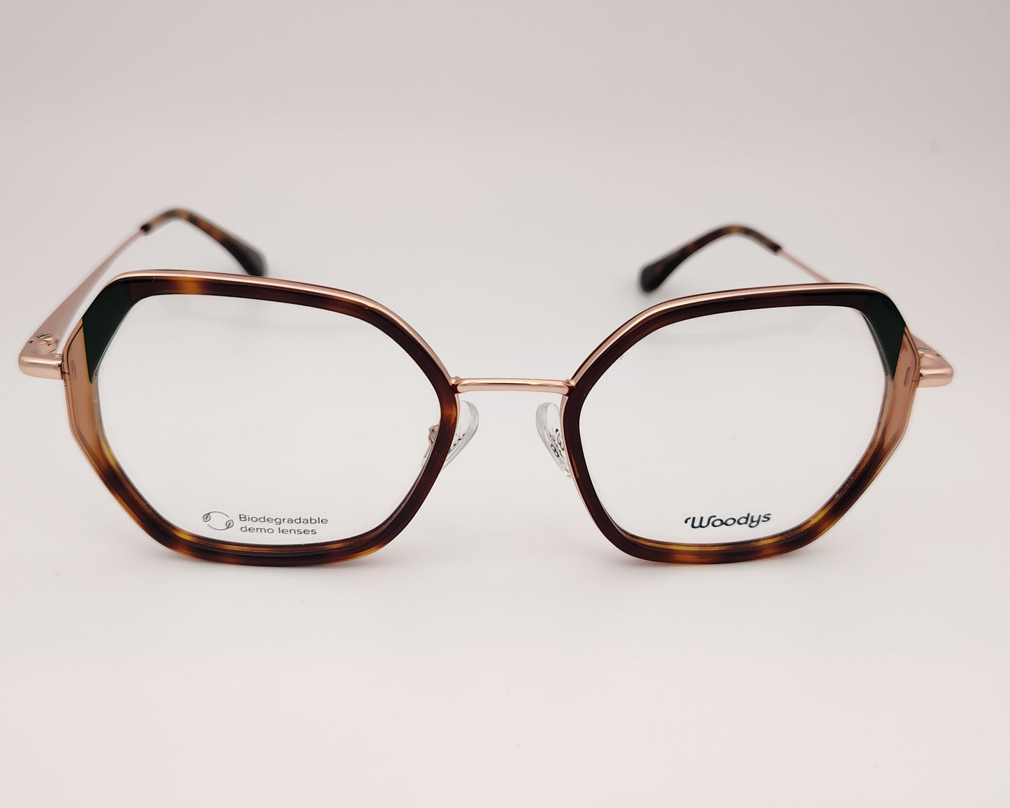 woodys paola 03 gafas de formato hexadonal en metal dorado con aros en acetado habana y detalles en verde