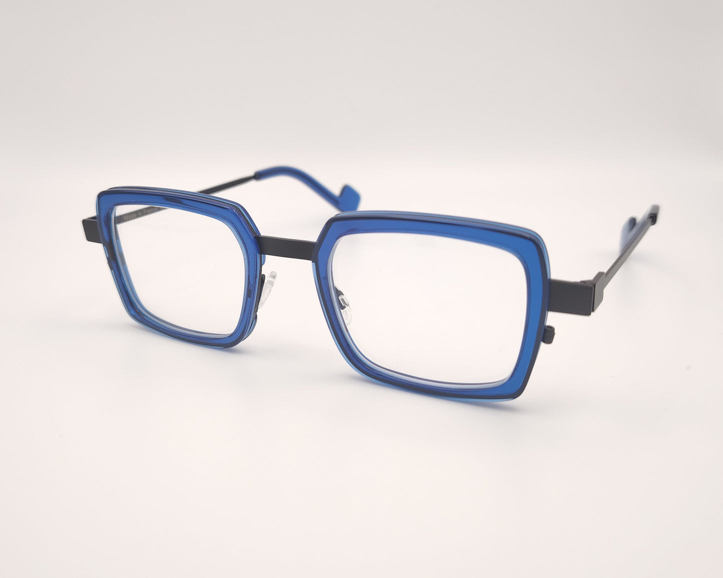gafas graduadas xit c303 rectangulares con frontal azul eléctrico y varillas metálicas negras