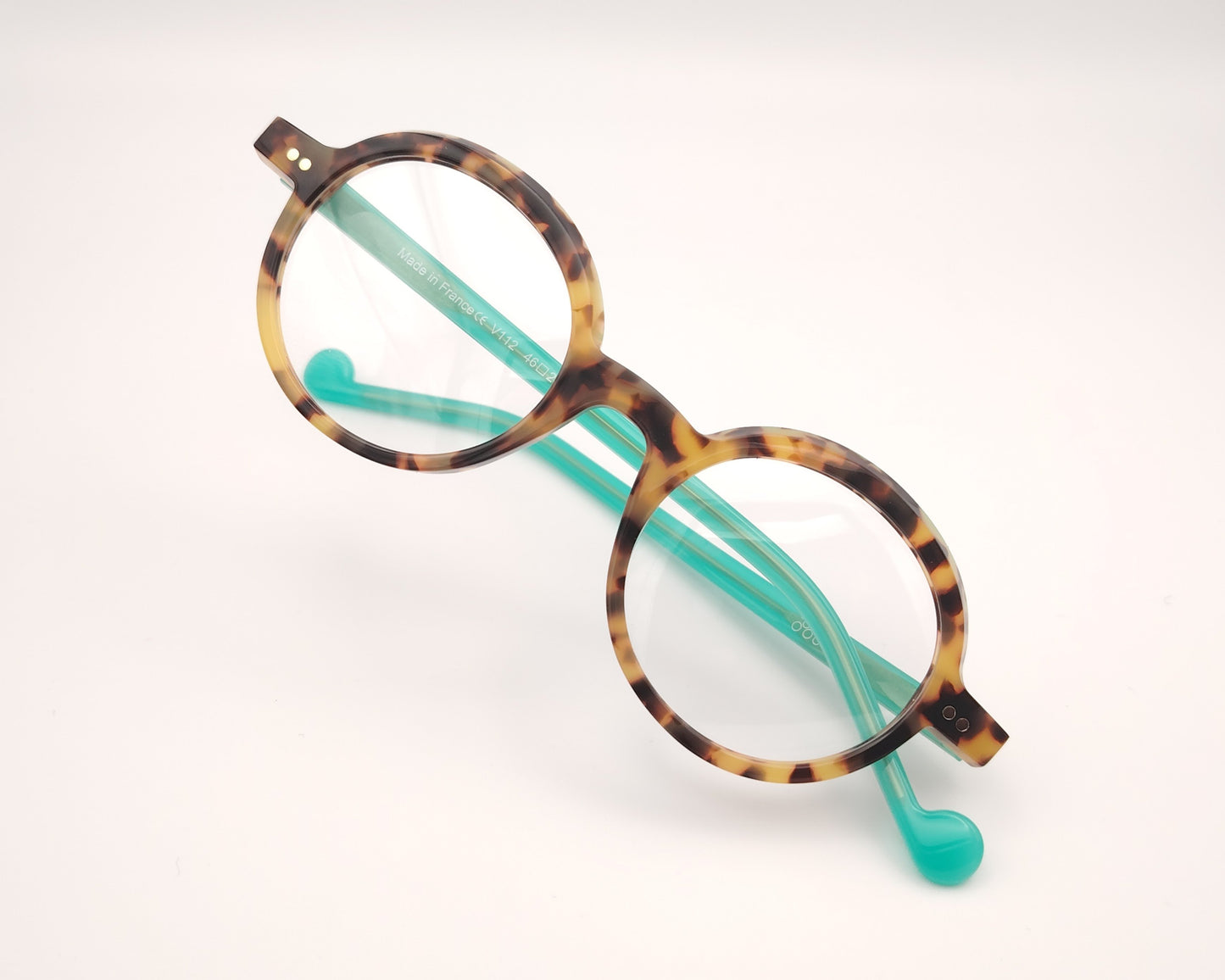 gafas graduadas xit v112 redondas carey con varillas color turquesa