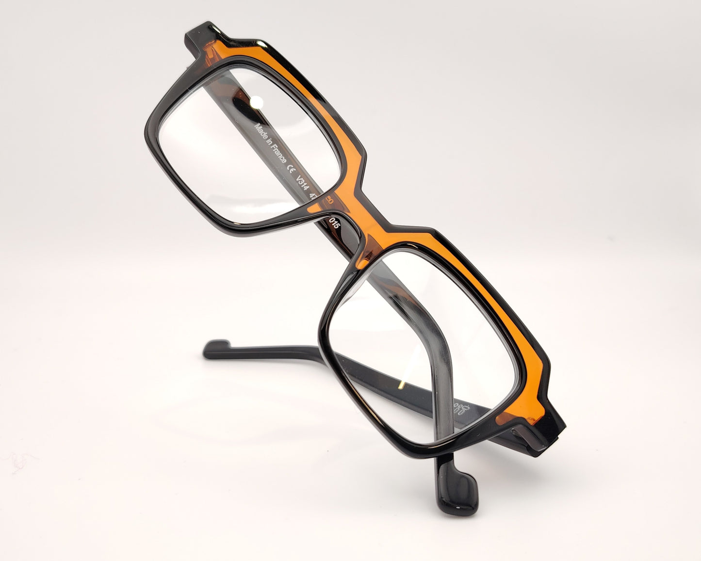 xit v314 015 gafas de acetato en formato cuadrado en color negro y ocre traslúcido