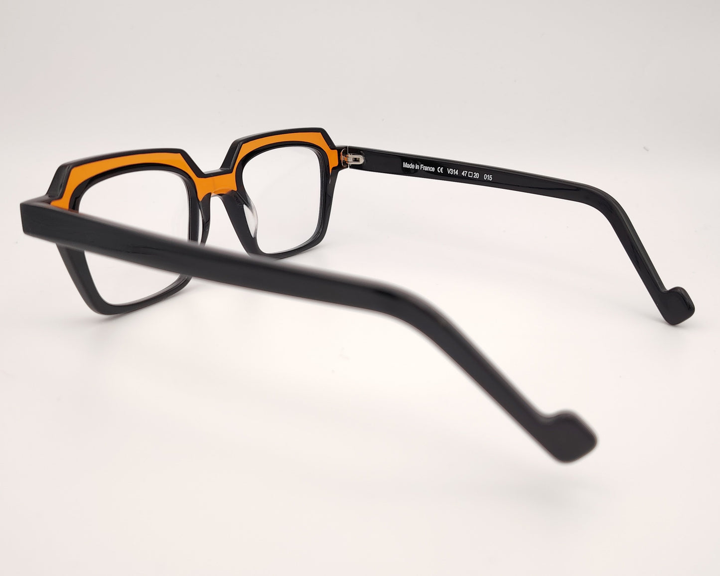 xit v314 015 gafas de acetato en formato cuadrado en color negro y ocre traslúcido