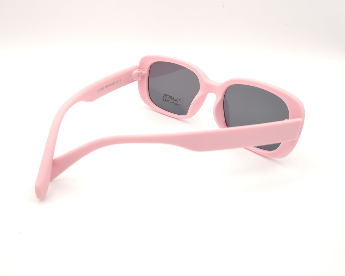 gafas de sol infantiles polarizadas con montura rectangular rosa pastel mate y lentes grises con protección uv