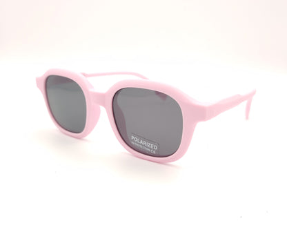 gafas de sol infantiles polarizadas con montura rosa claro y lentes grises con protección uv.