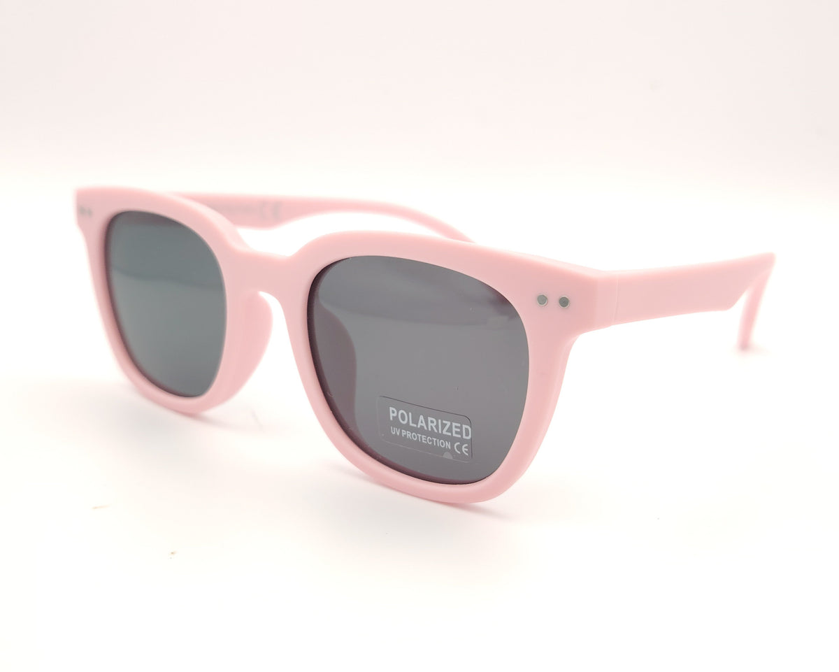 gafas de sol infantiles polarizadas con montura rosa pastel mate y lentes grises con protección uv