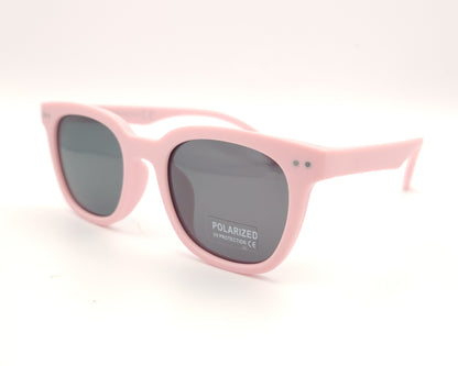 gafas de sol infantiles polarizadas con montura rosa pastel mate y lentes grises con protección uv