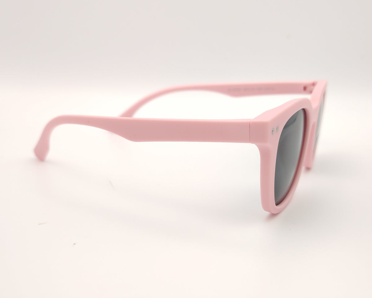 gafas de sol infantiles polarizadas con montura rosa pastel mate y lentes grises con protección uv