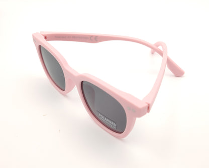 gafas de sol infantiles polarizadas con montura rosa pastel mate y lentes grises con protección uv