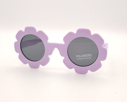 gafas de sol infantiles polarizadas con montura lila en forma de flor y lentes grises con protección UV