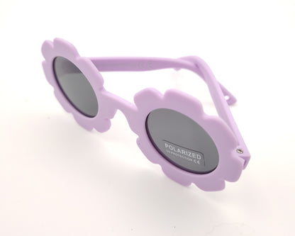 gafas de sol infantiles polarizadas con montura lila en forma de flor y lentes grises con protección UV