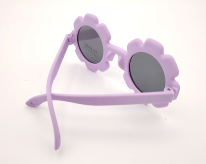 gafas de sol infantiles polarizadas con montura lila en forma de flor y lentes grises con protección UV