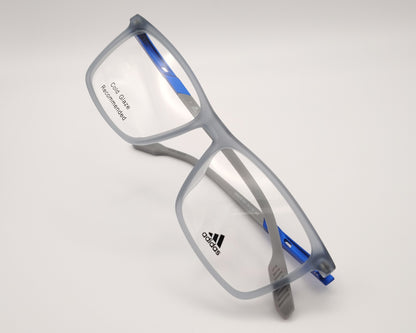 adidas sp5070 020 gafas graduadas de forma rectangular con montura en gris translúcido y detalles en azul diseño ligero y moderno con un estilo deportivo ideal para el uso diario