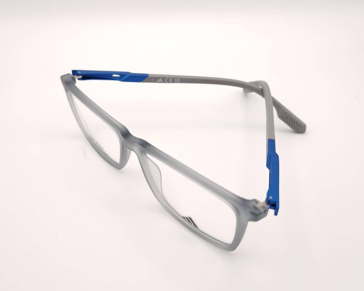 adidas sp5070 020 gafas graduadas de forma rectangular con montura en gris translúcido y detalles en azul diseño ligero