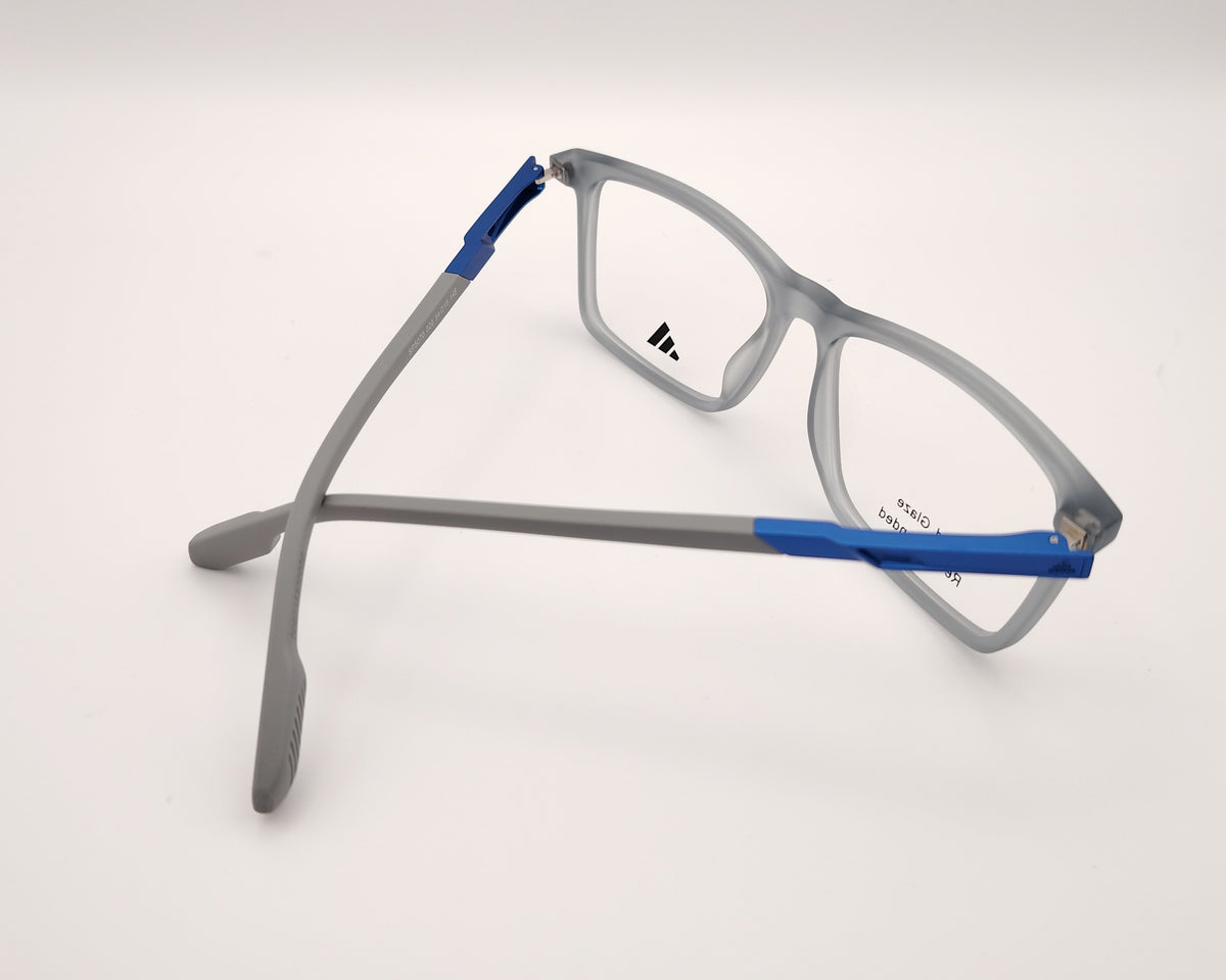 adidas sp5070 020 gafas graduadas de forma rectangular con montura en gris translúcido y detalles en azul diseño ligero
