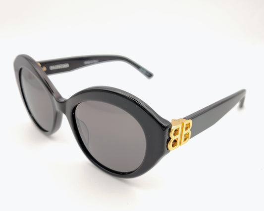 balenciaga bb0133s 001 gafas de sol en forma ovalada de acetato negro con lentes a juego y logo de metal dorado en las varillas