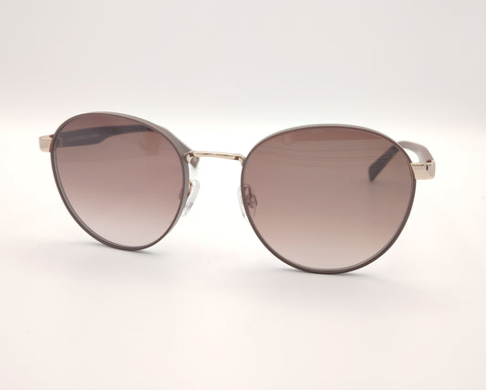 gafas de sol redondas con montura marrón y detalles dorados en los talones