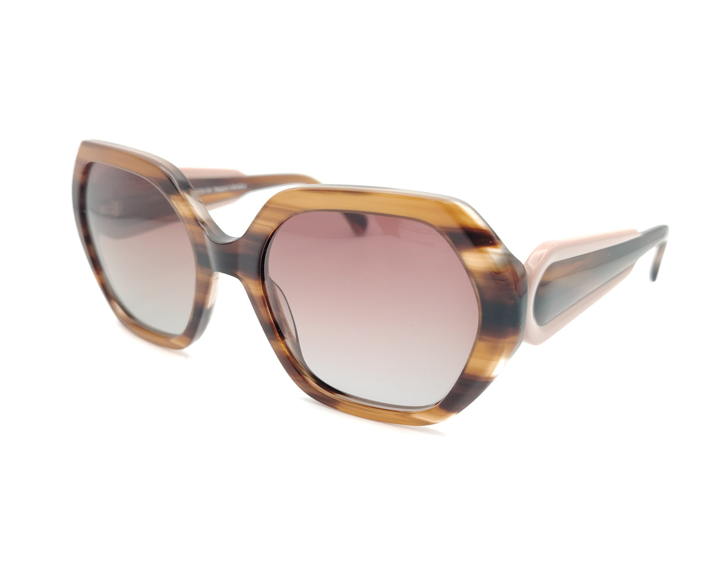 gafas de sol polarizadas oversize veteadas en tonos marrón miel con varillas color maquillaje
