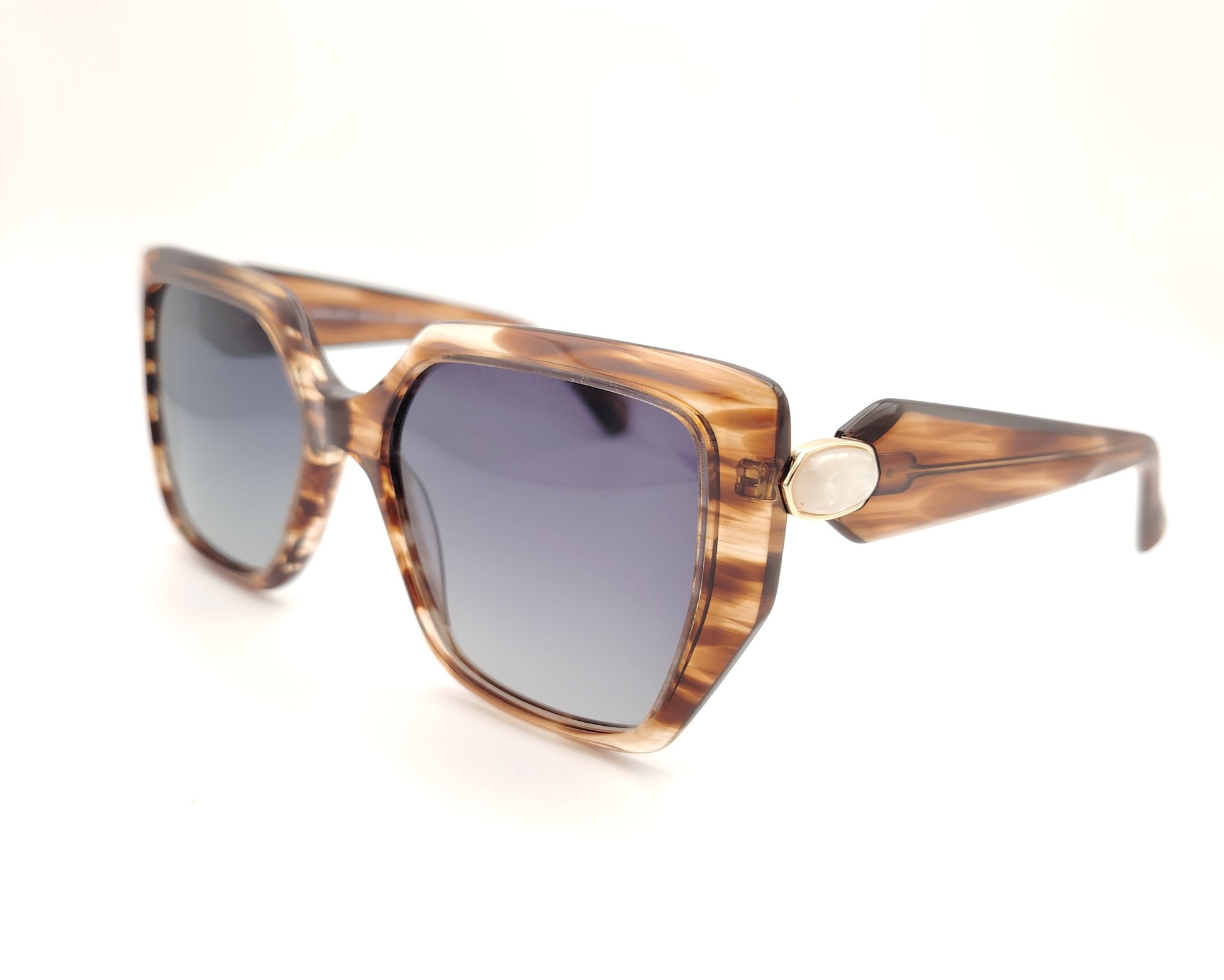 gafas de sol polarizadas cuadradas oversize color miel veteado con detalle decorativo en las varillas