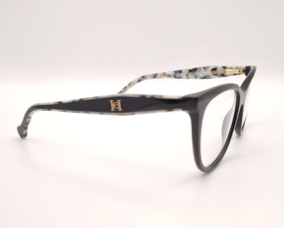 gafas carolina herrera negras con varillas moteadas y clip-on solar con lentes oscuras