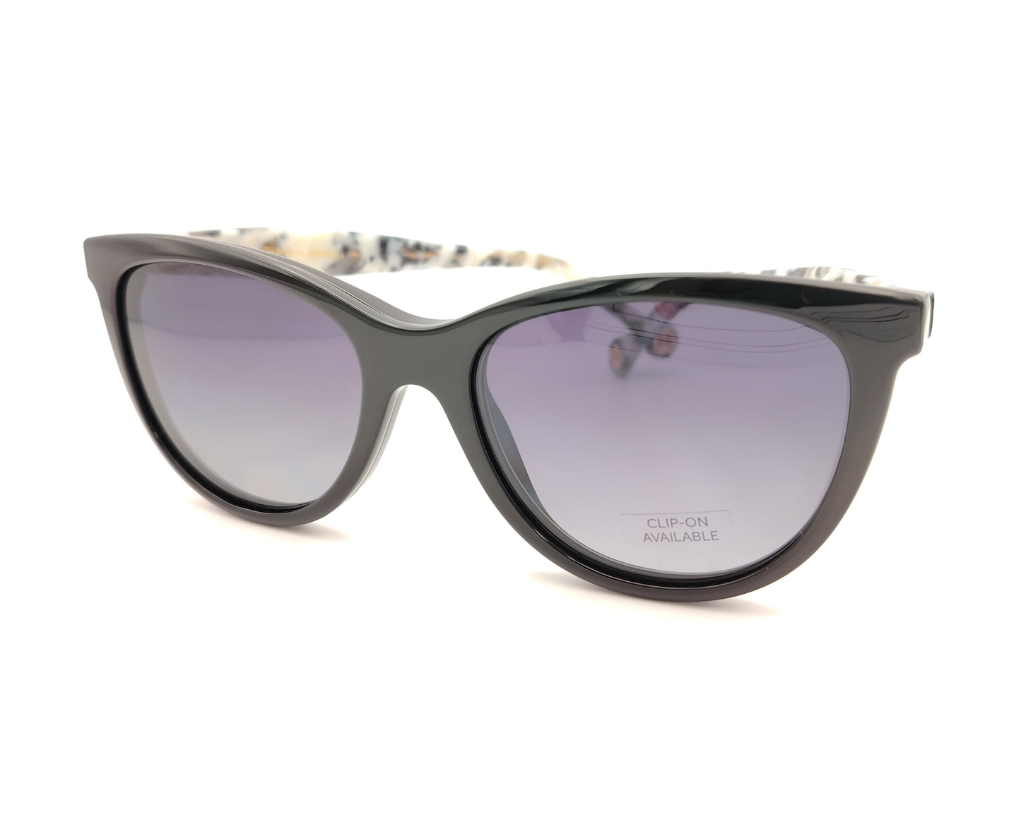 gafas carolina herrera negras con varillas moteadas y clip-on solar con lentes oscuras