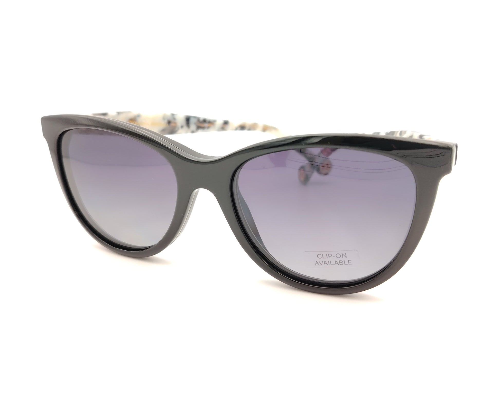 gafas carolina herrera negras con varillas moteadas y clip-on solar con lentes oscuras