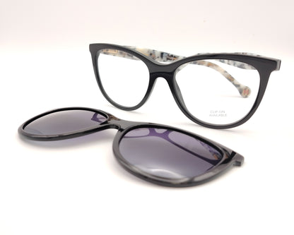 gafas carolina herrera negras con varillas moteadas y clip-on solar con lentes oscuras