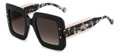 gafas de sol carolina herrera oversize negras con lentes rosadas degradadas y varillas marmoleadas