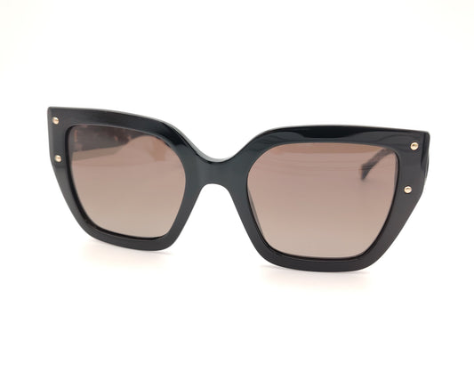 gafas de sol cuadradas en negro con varillas anchas efecto mármol en blanco y negro y lentes oscuras