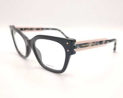 gafas graduadas carolina herrera de forma cuadrada en negro con varillas rosa claro y detalles marmolados