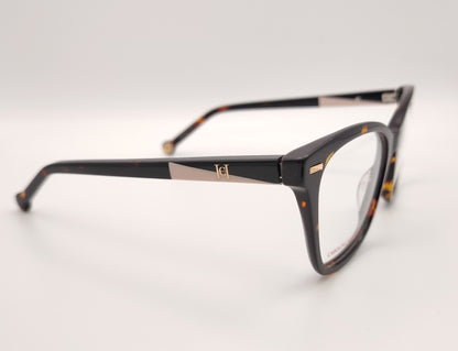 gafas graduadas carolina herrera de forma cat eye en carey oscuro con varillas negro y rosa claro y clip on solar