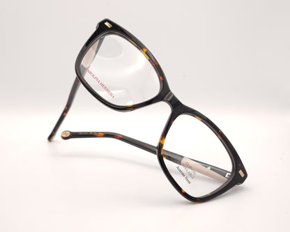 gafas graduadas carolina herrera de forma cat eye en carey oscuro con varillas negro y rosa claro y clip on solar