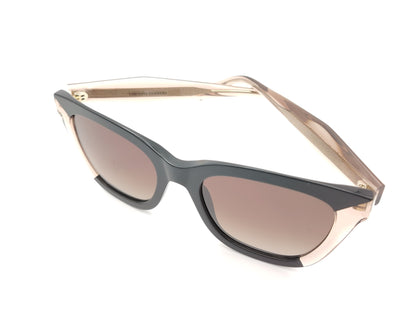 gafas de sol carolina herrera cat eye negras y nude translúcidas con lentes degradadas marrones