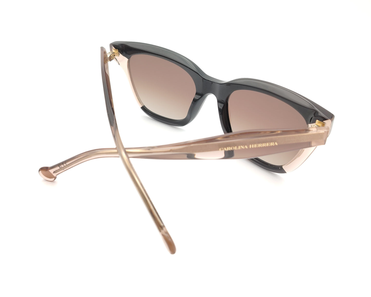 gafas de sol carolina herrera cat eye negras y nude translúcidas con lentes degradadas marrones